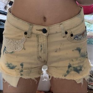 yellow acid wash denim shorts